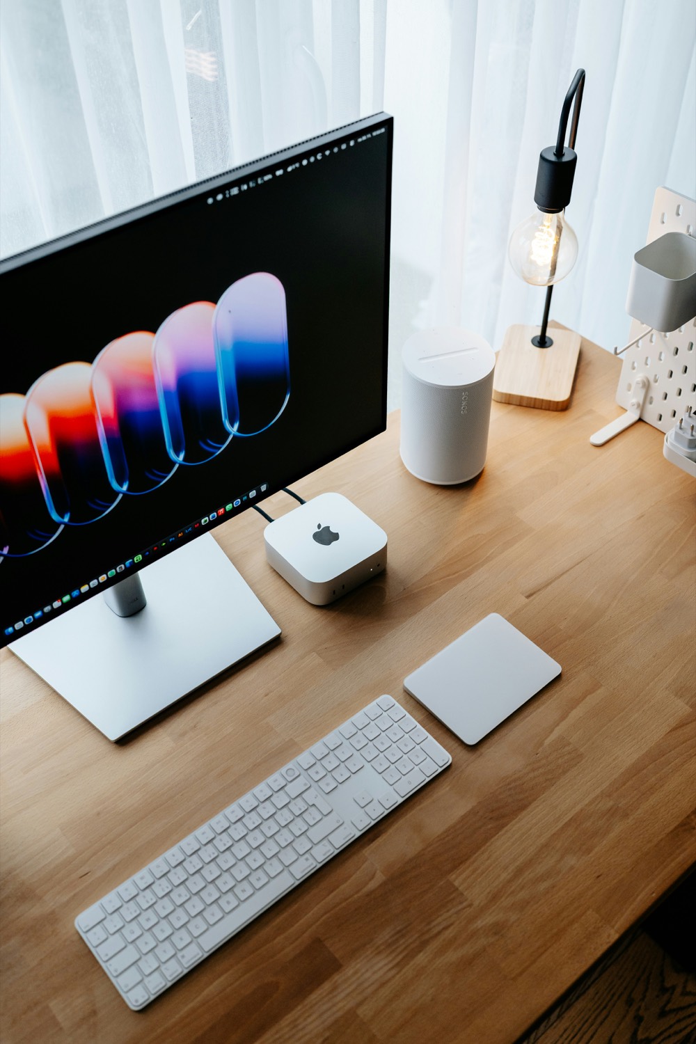 A calm, modern studio desk setup